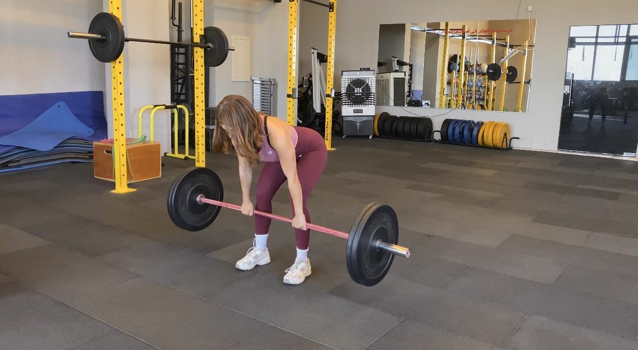 Mandy deadlifting in the gym